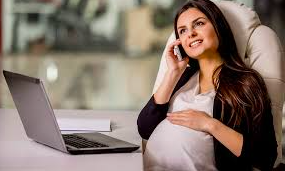 Pregnant employee discussing PWFA - Pregnant Workers Fairness Act